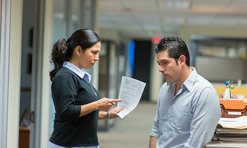 man and woman talking